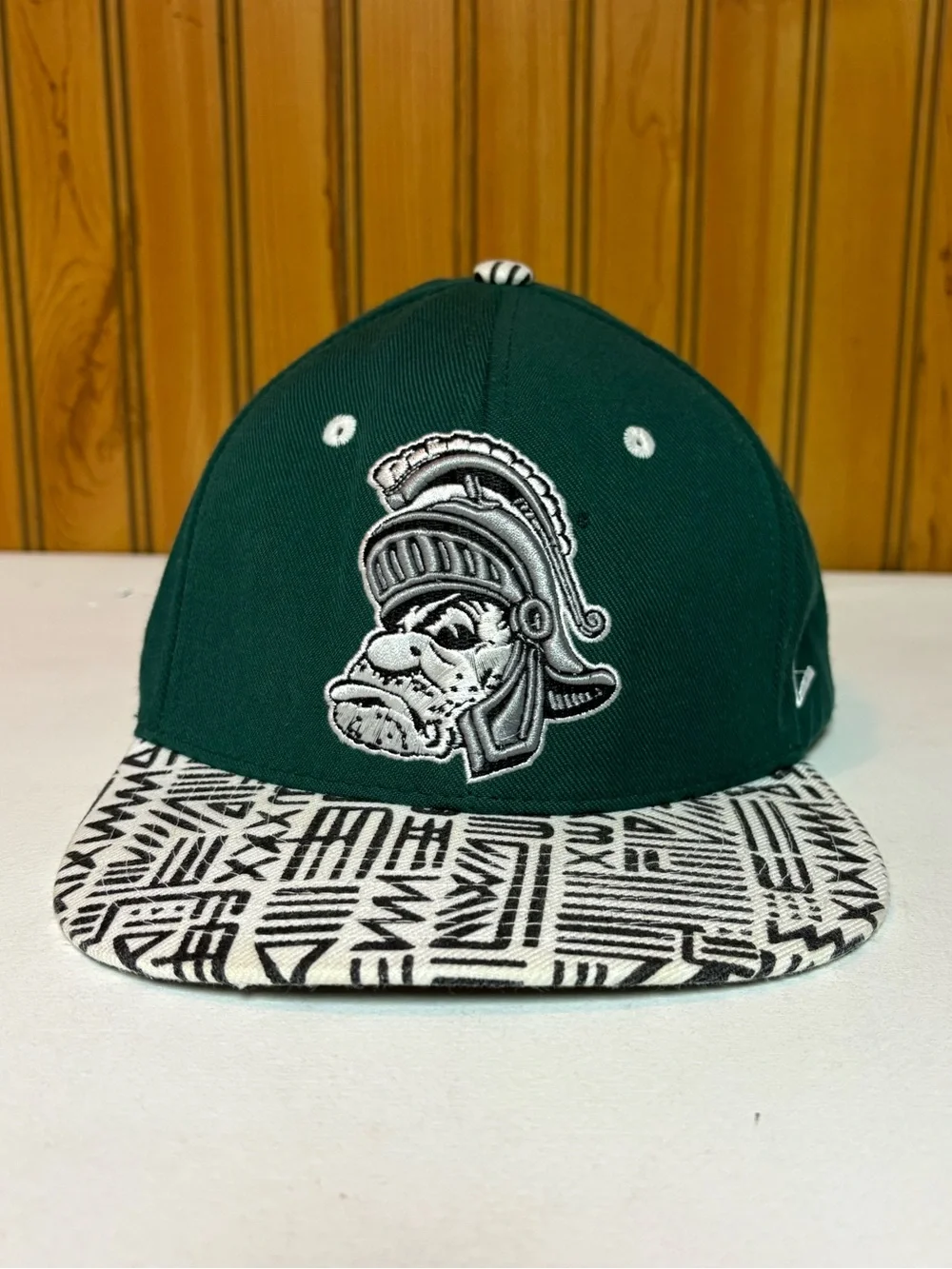 Zephyr Green Hat with Red and Navy Logo Patch